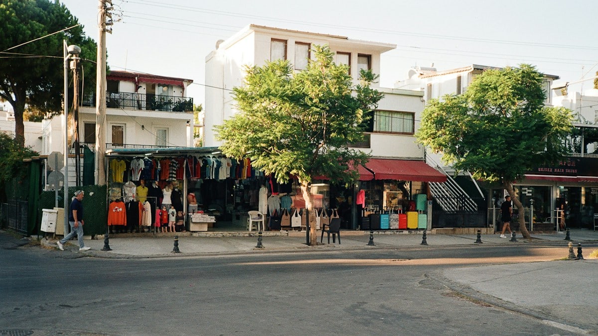 A street corner with clothing shops and luggage in Bodrum, Türkiye